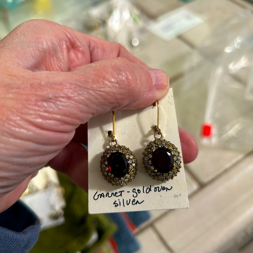Dark garnet. Good over silver white topaz earrings